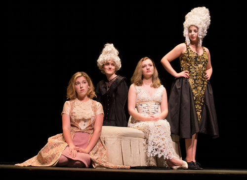 students on stage at a theatre production 