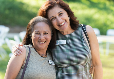 provost and new faculty posing for a photo 