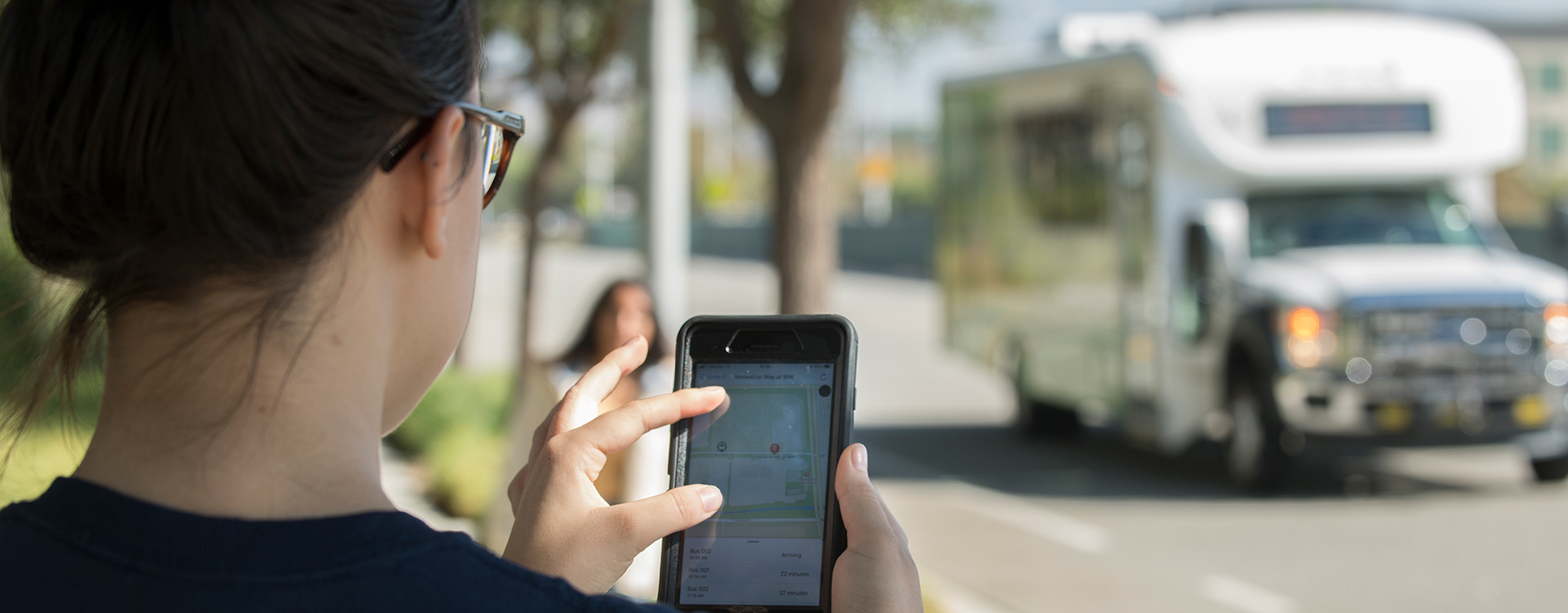 Student uses an app for transportation services.