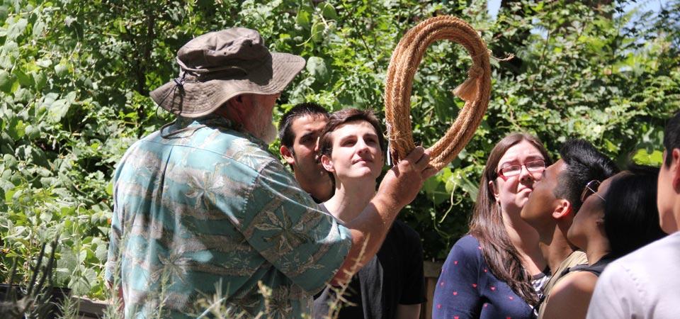 Professor Brown holding a rope