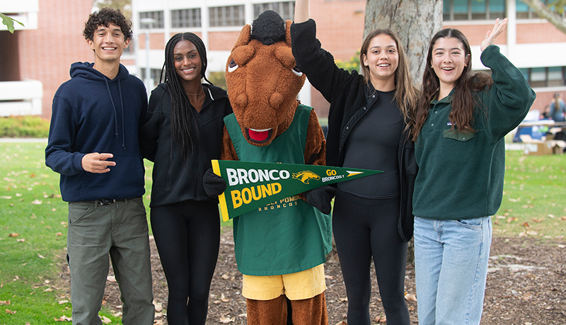 A group of students with Billy Bronco during the 2024 Explore CPP Day.