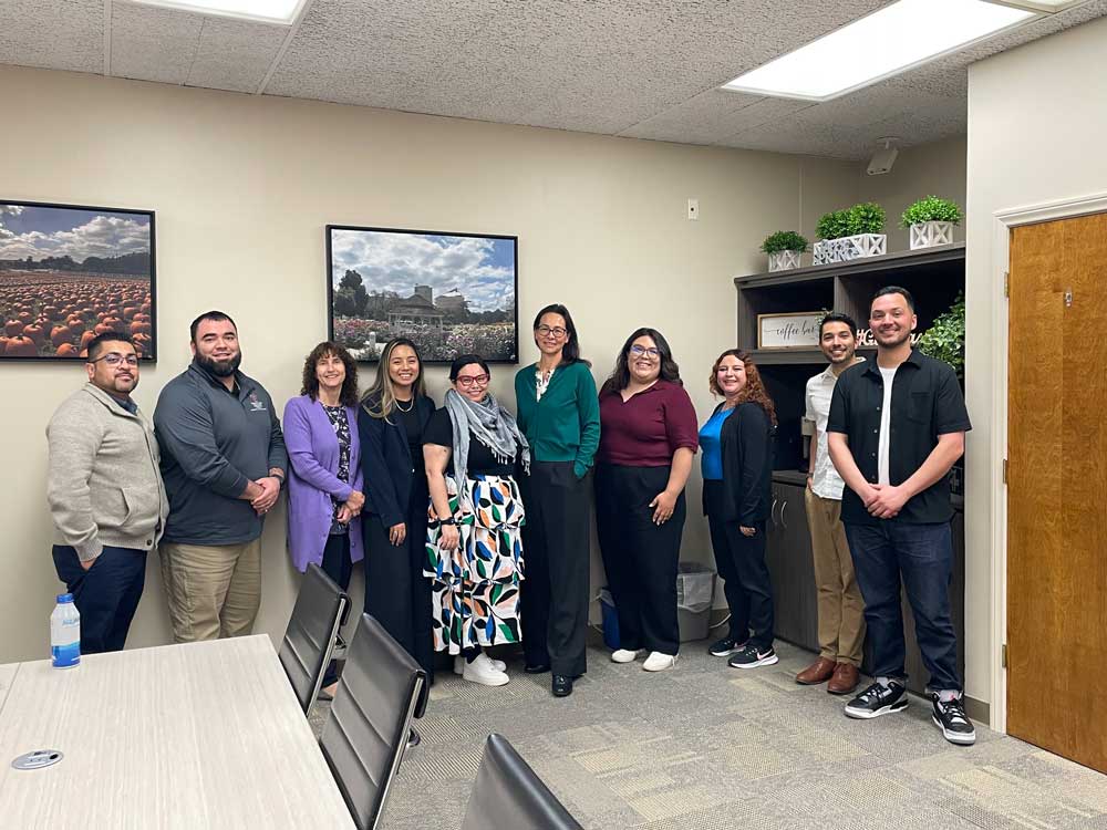 In the photo: Lisa Kessler, Jonathan Iberra, Sandra Gomez, Leslie Luqueno, Provost Terri Gomez, Jonathan Perez, Omar Sanchez, Luz Burgos Lopez, and Marialexia Zaragoza