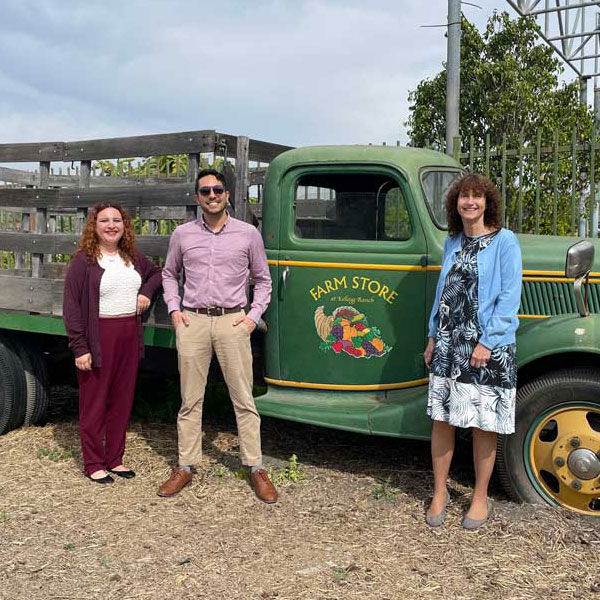 Lisa Kessler and mentors in front of truck