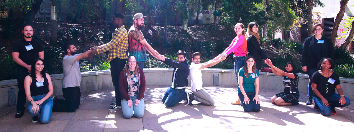 A group of Cal-Bridge scholars form a bridge to symbolize the program.