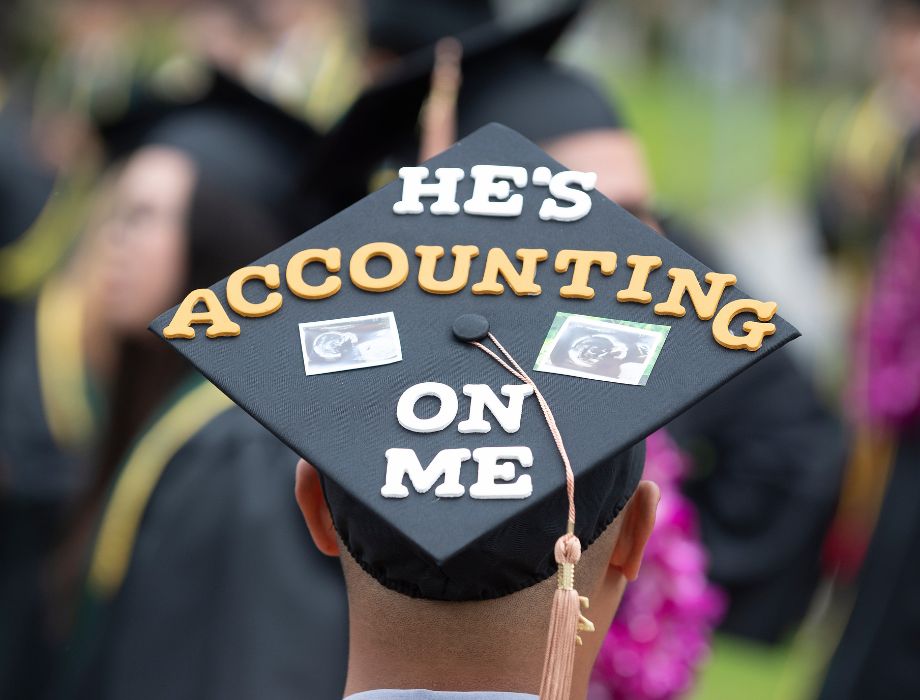 Graduating Student from Accounting with Grad Hat Text