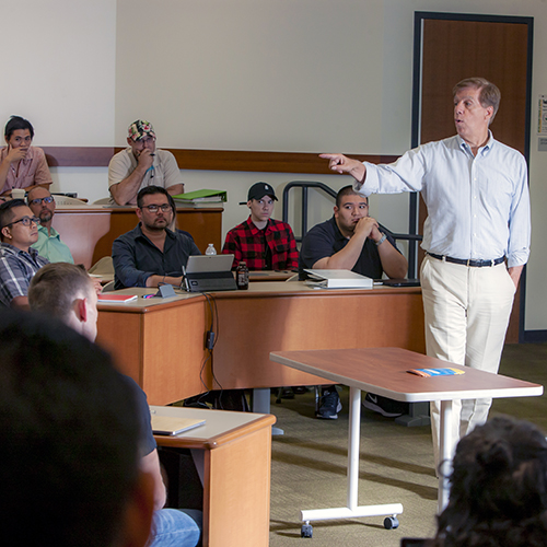 Professor in front of class lecturing