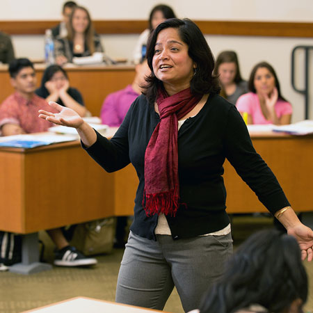 Female professor lecturing students