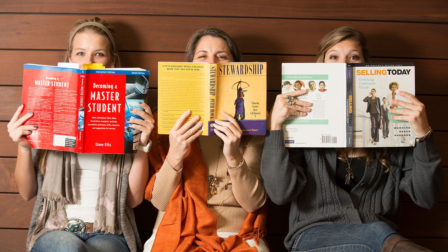 Students with book photo