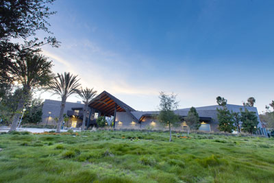 Front image of CBA Complex at sunset