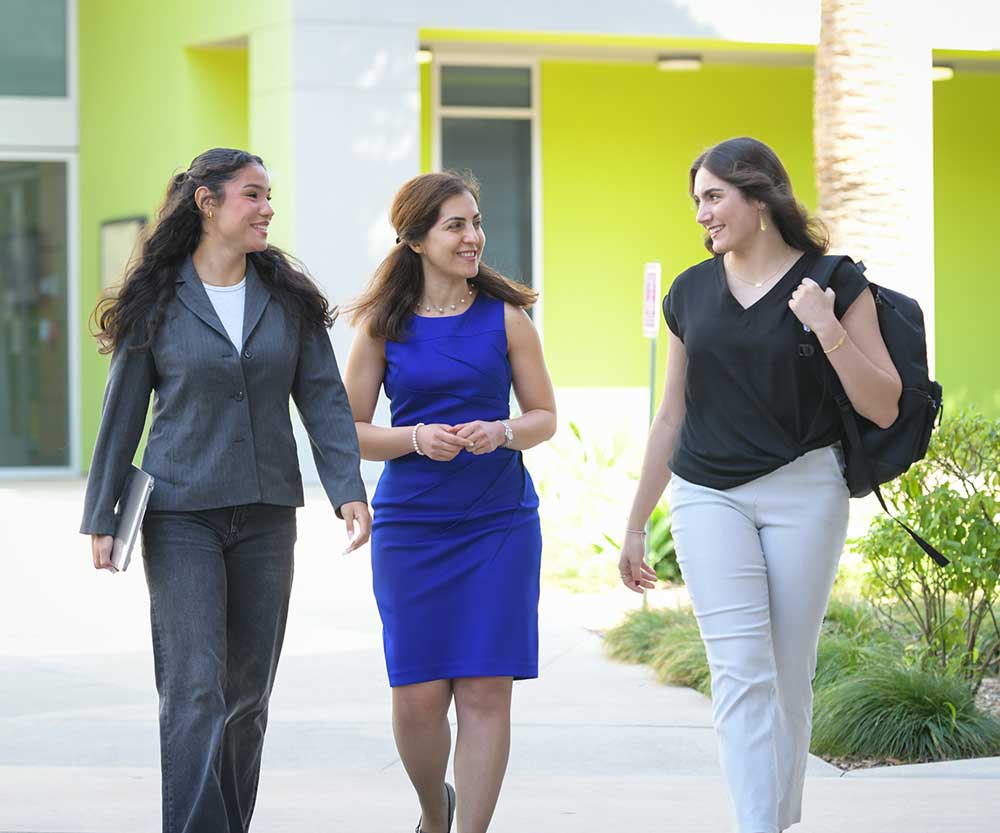 Students walking in CBA quad