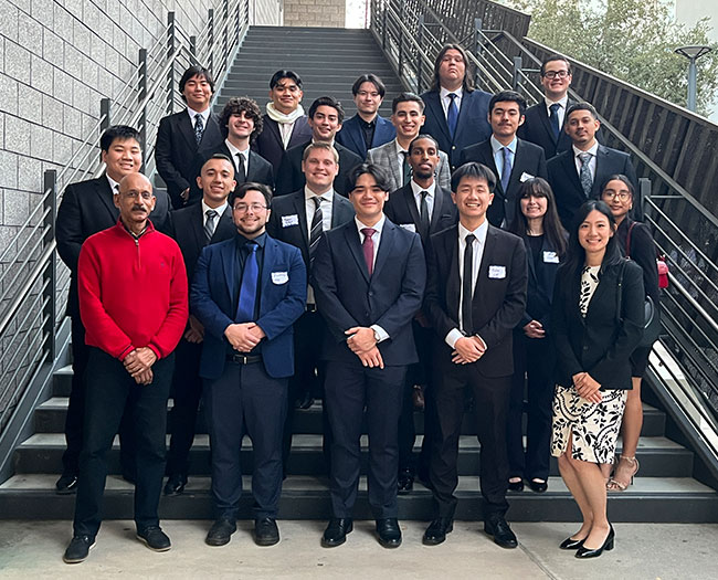 Team posing at student managed investment fund event