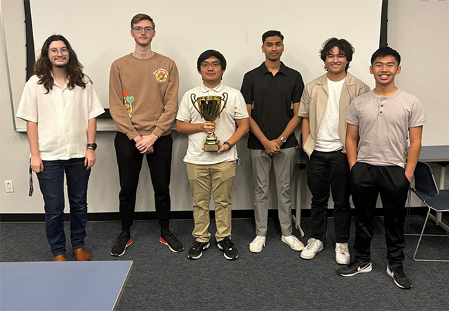 CPTC Team holding trophy after event