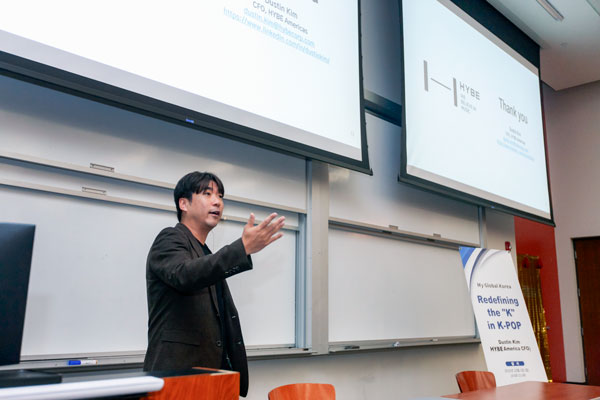 Dustin Kim from Hybe International thanks students after his presentation