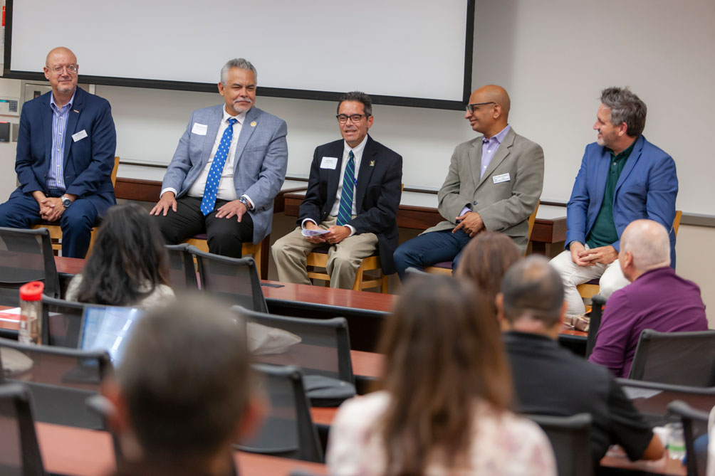 Attendees interact with panel of Deans from multiple business schools at La Familia conference