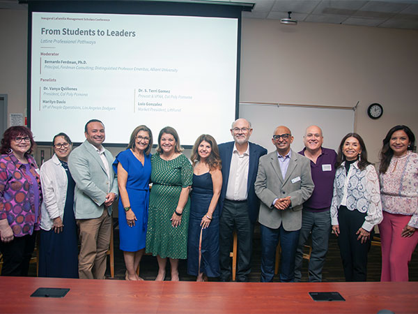 Group photo of panelists at La Familia Conference