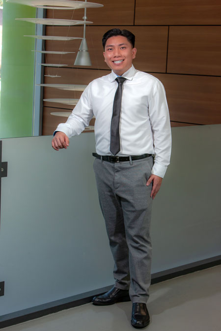 Sean Lee inside building 164 at the College of Business Administration