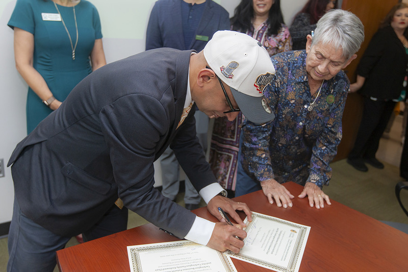 Dean Dr. Sandeep Krishnamurthy Signing the Certificate