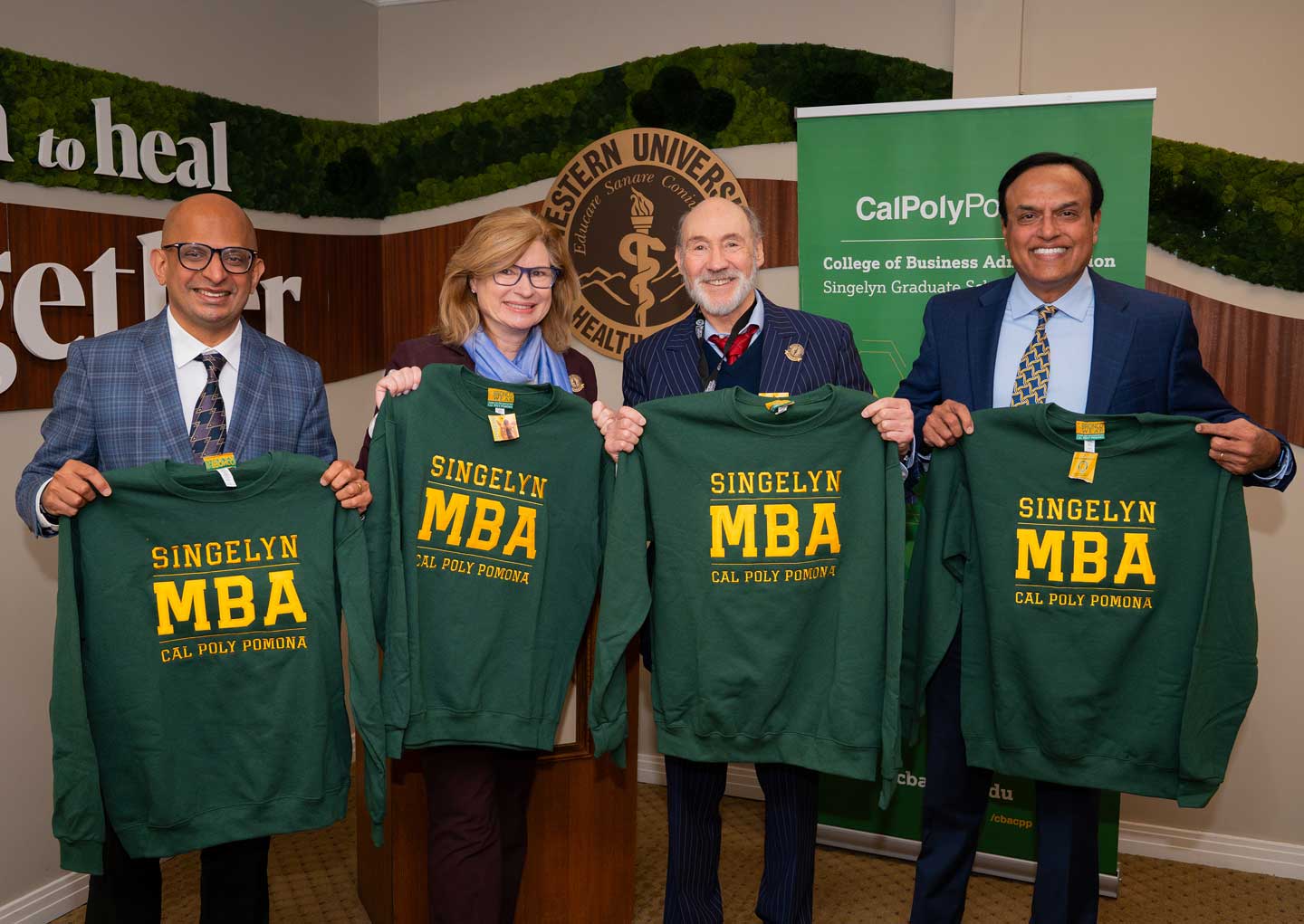 Singelyn Family Dean with Western Health Death and supporters showing MBA sweatshirts