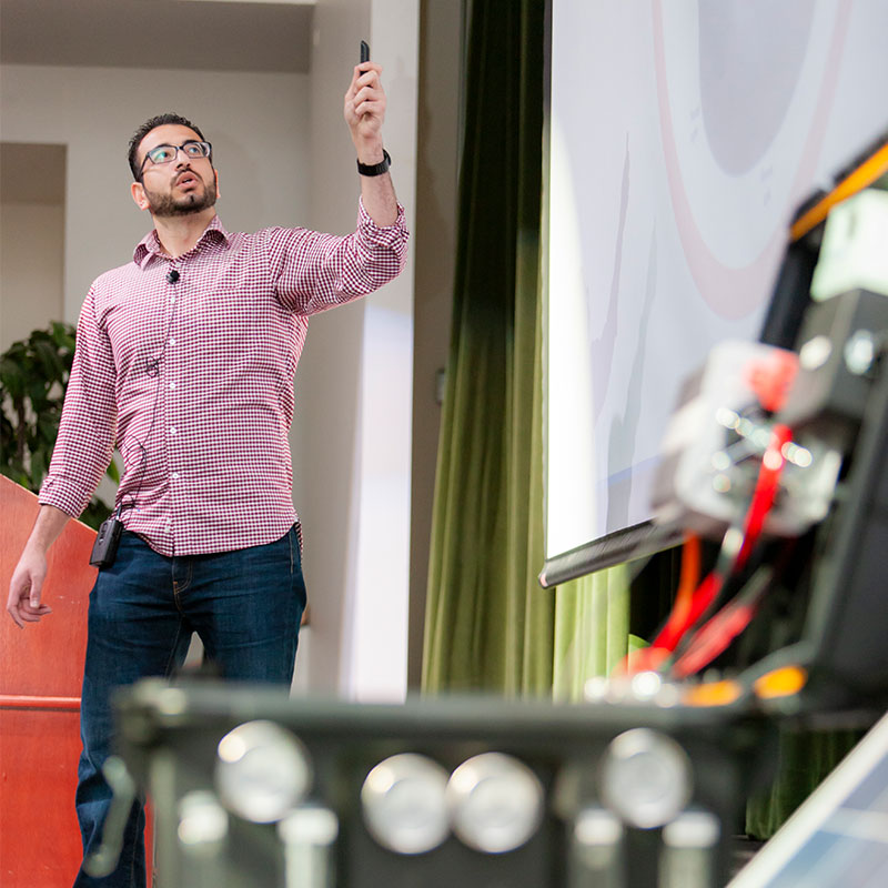 Student presenting idea on stage during the Bronco Startup Challenge