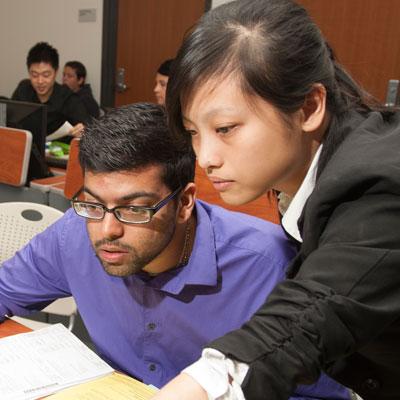 Female professor helping a student