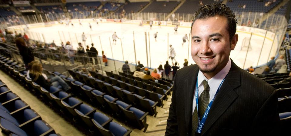 student intern at hockey arena