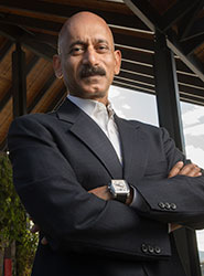 Professor Tomkoria in front of CBA building