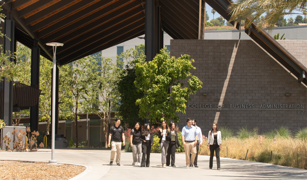 Students walk in front of College of Business Administration building