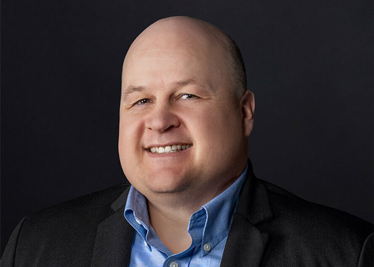Headshot of Travis Muhlestein