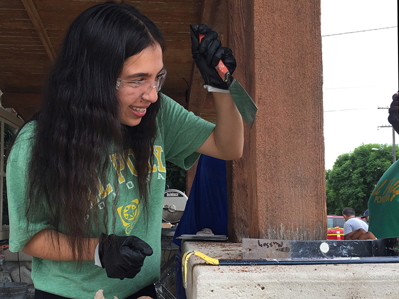 CPP student at the Habitat for Humanity service project , one of the events supported by CCE.