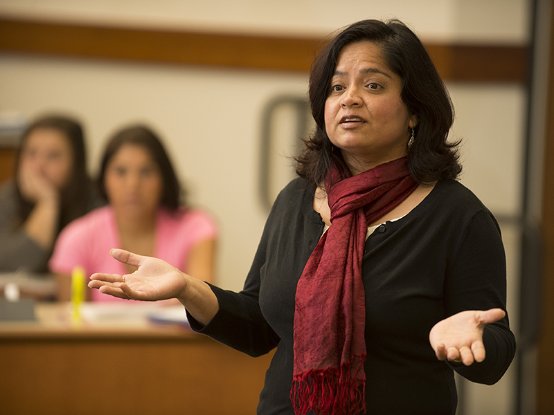 Faculty member talking about service learning.