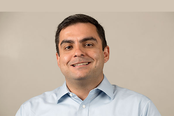 Dr. Gabe Granco smiling in light blue shirt