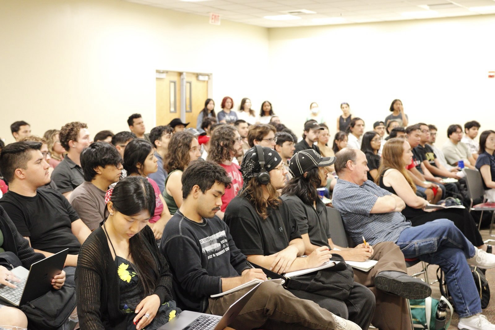 Image of students attending a seminar at The Democracy Institute