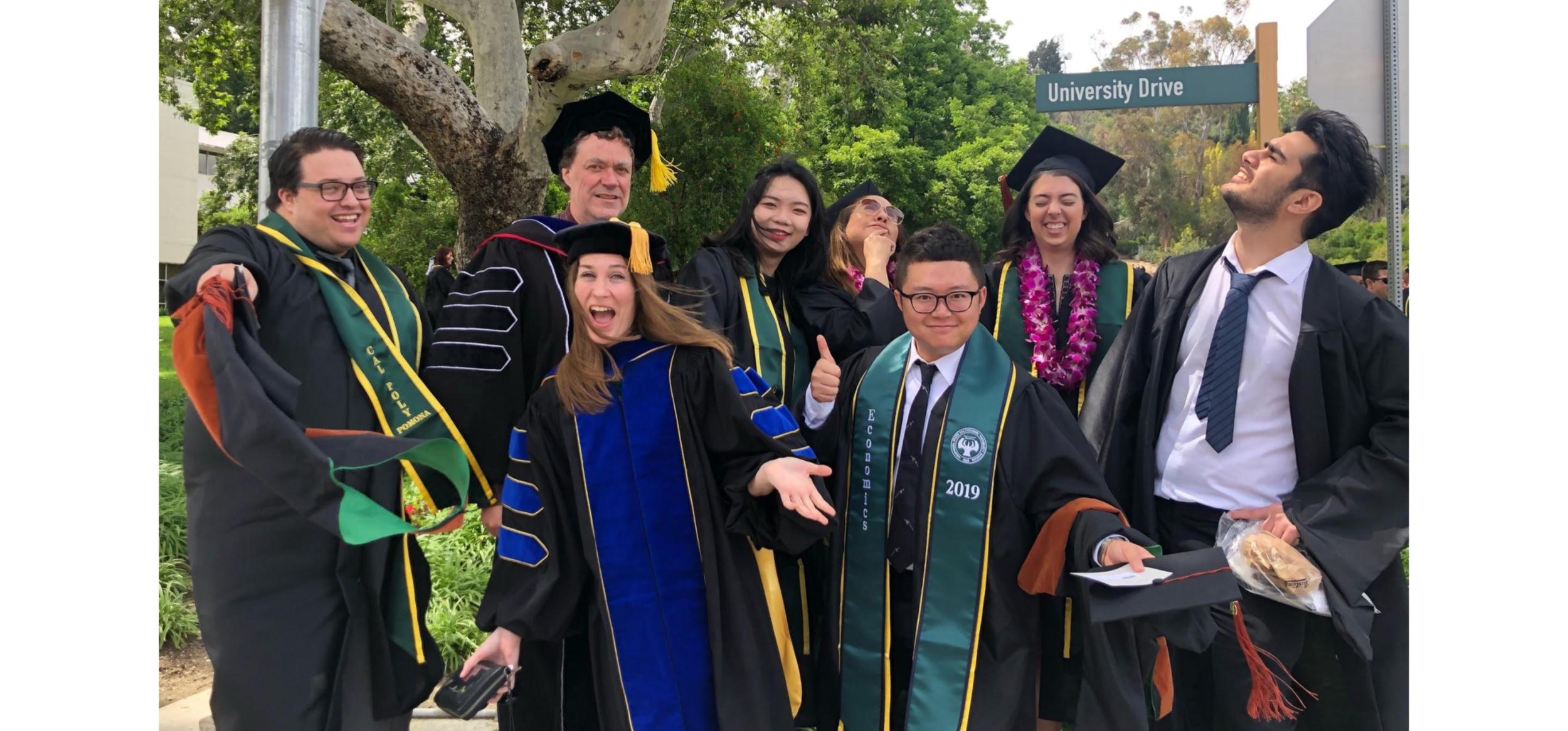 Students at graduation at University Drive