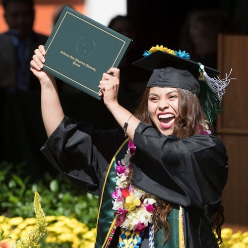 Graduate student holding the certificate