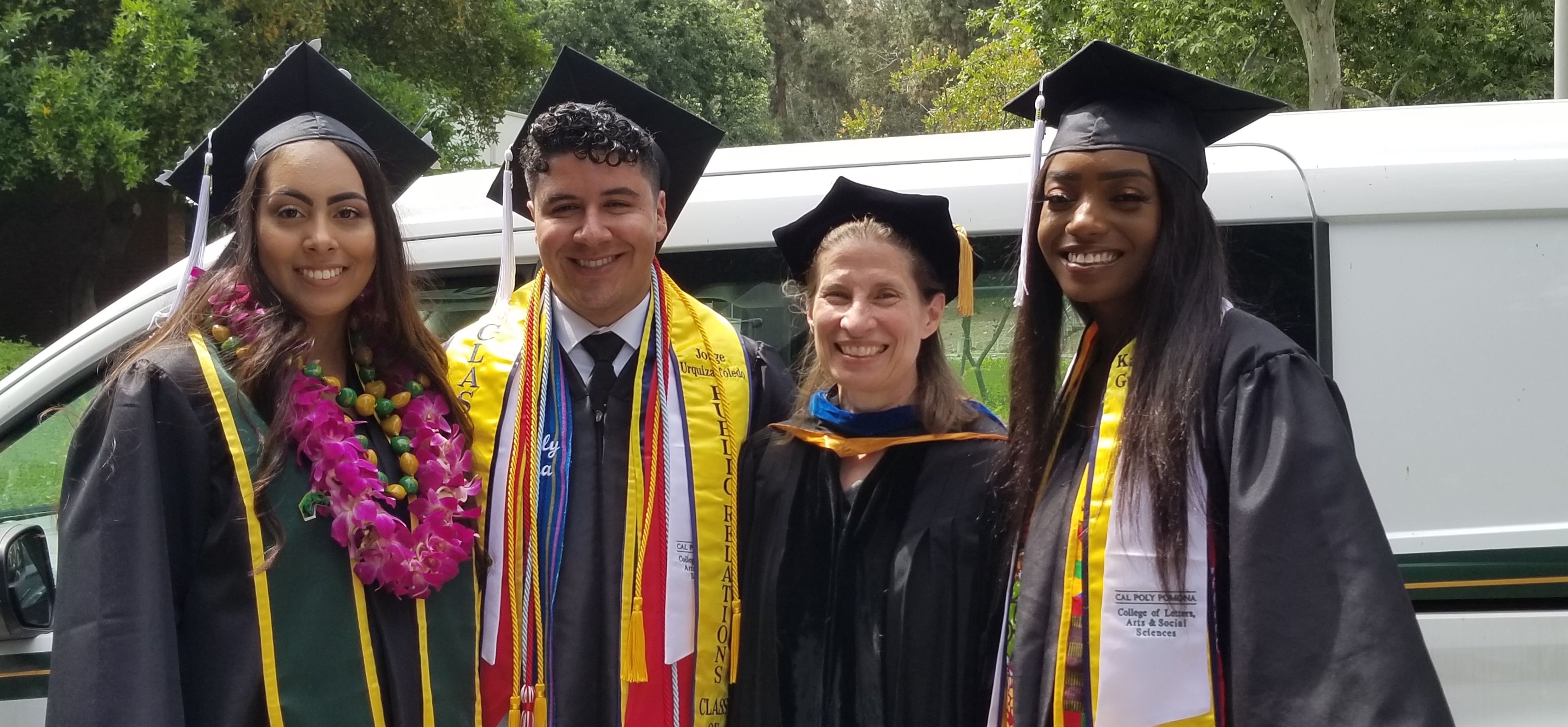 Dr. Amanda Podany and History students at the 2019 Commencement