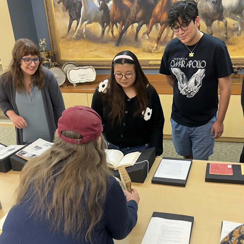 students viewing an ancient article