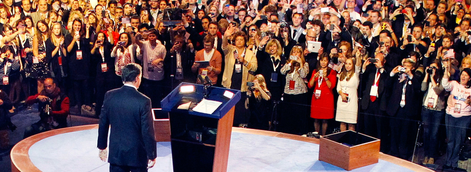 Mitt Romney walking to a podium