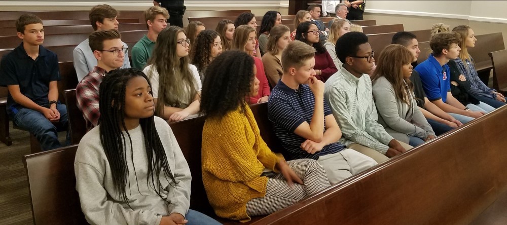 Students sitting in a courtroom
