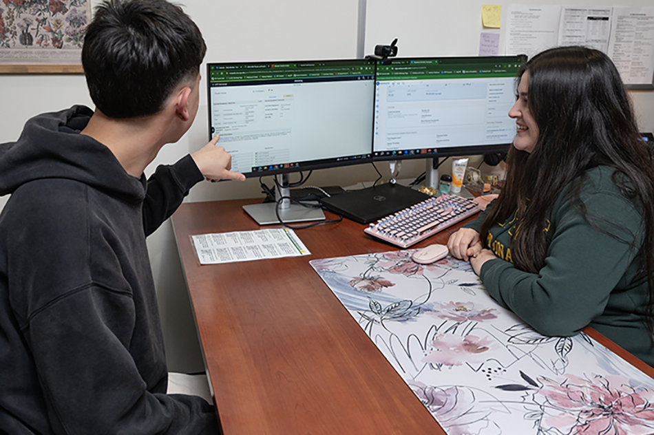 Advisor reviewing plan with student