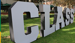 CLASS Letters on grass in front of building