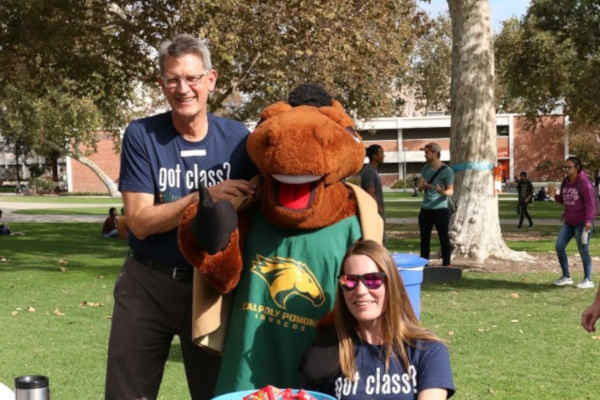 2 staff with a mascot