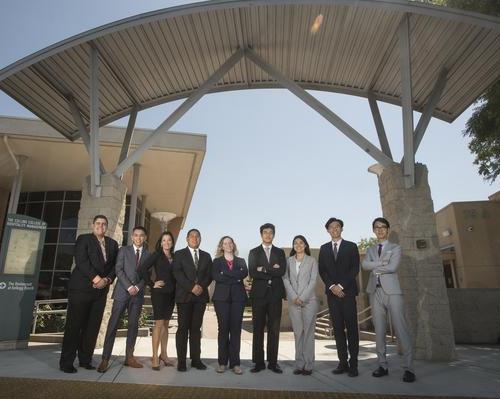 collins ambassadors in front of the college