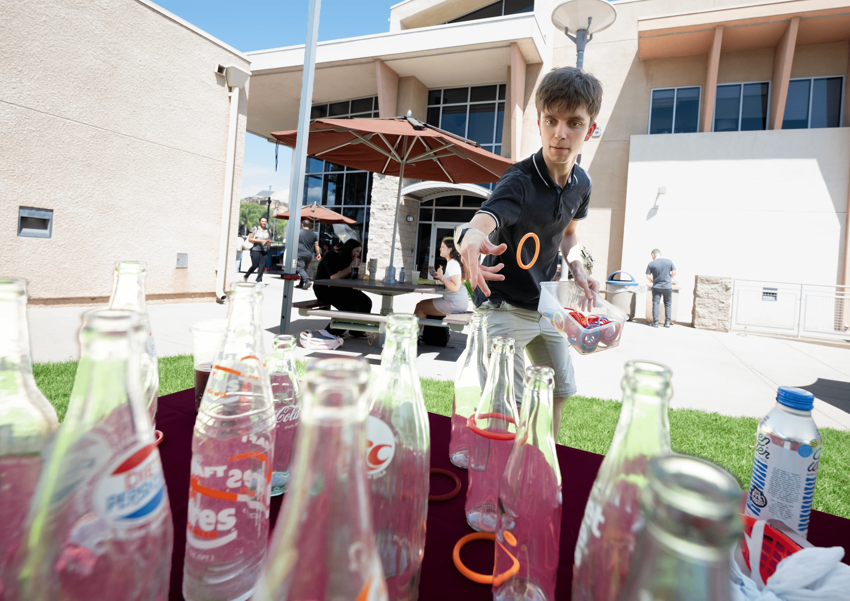 students play ring toss at a back to school event