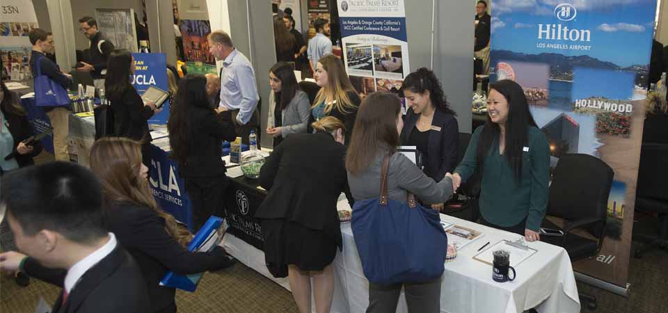 Hospitality Career Expo student interacting with participating employers