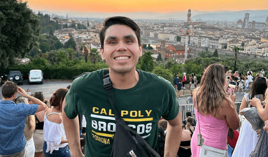Male student smiles while in Florence, Italy.