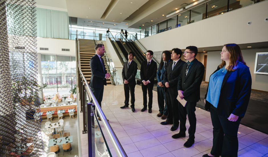 Students on field trip listening to guide on indoor balcony at JW Marriott Los Angeles LA Live