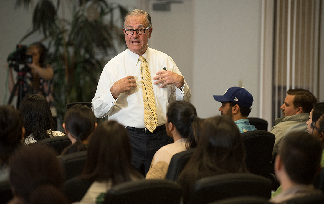 Image of Gregg Patterson talking to an audience indoors.