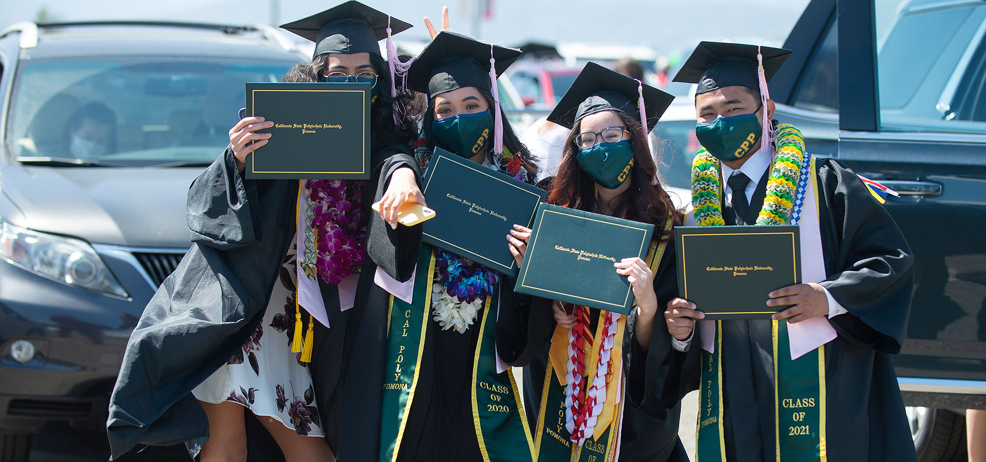 A group of grads pose for a photo