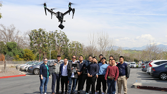 students flying drone
