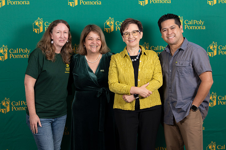 Larisa Preiser-Houy, Arnold Ulgado and Jennifer Cousens  with President Vanya Quiñones